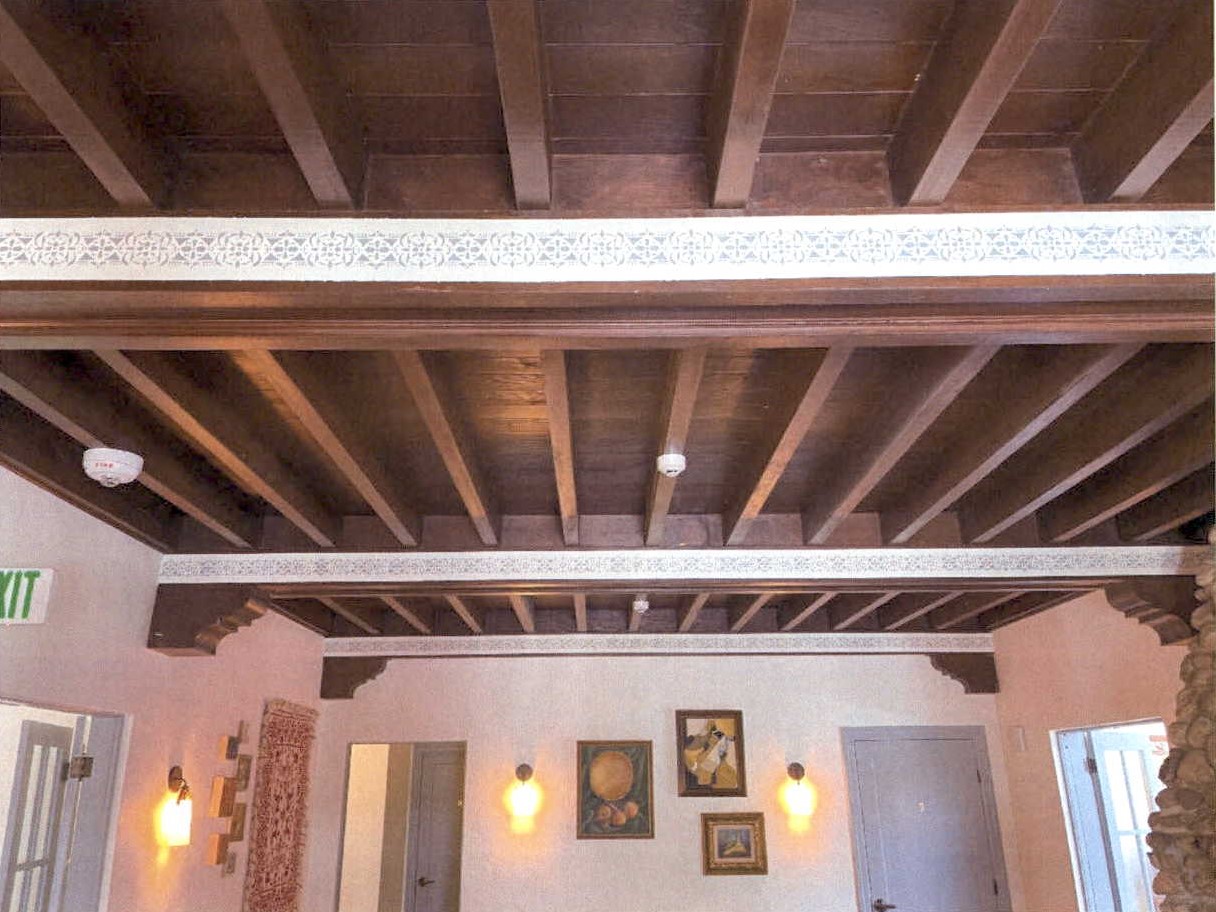 Restored exposed beam ceiling in main level salon 